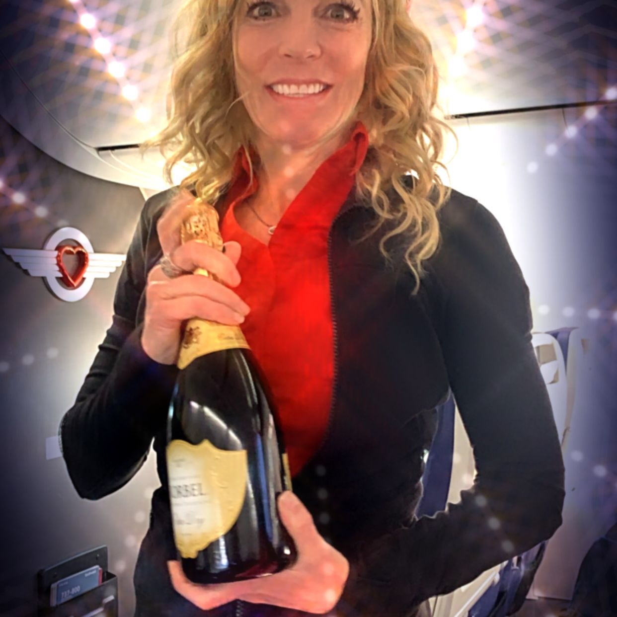 Champagne held by a Flight Attendant