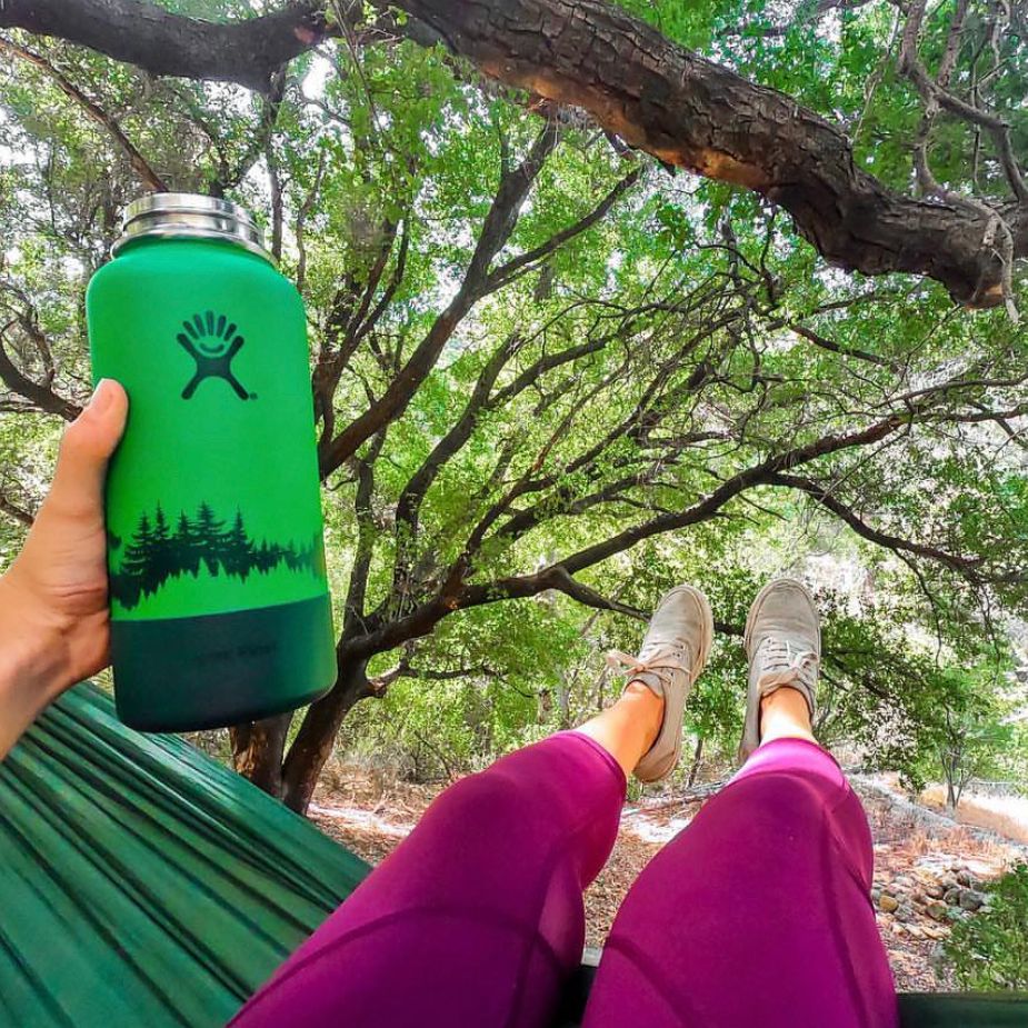 Girl in hammock on an adventure with Hydroflask