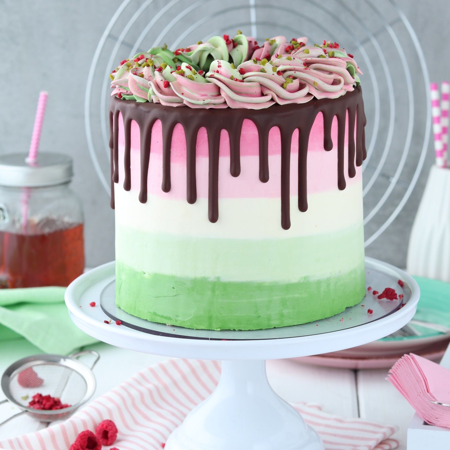 Ombre cake with raspberry and pistachio filling